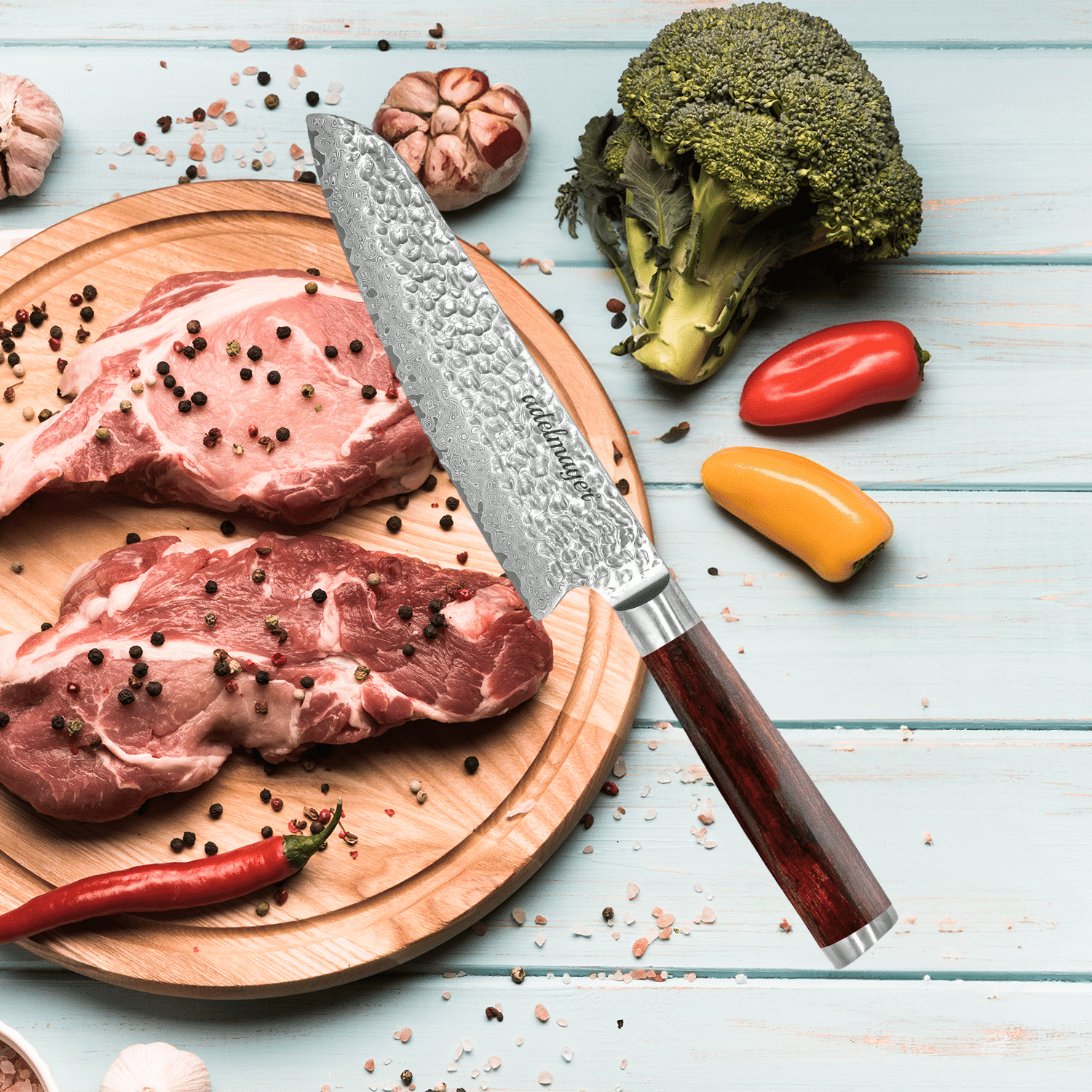 Raw meat and vegetables on a wooden board