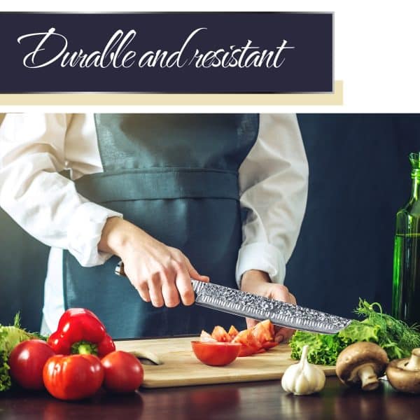 Chef slicing tomato on cutting board.