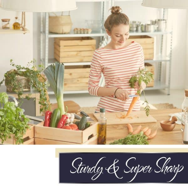 Woman chopping vegetables in kitchen.