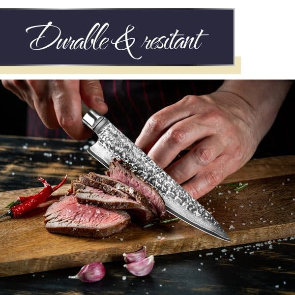 Chef slicing steak with patterned knife