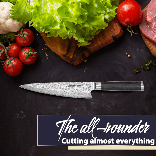 Damascus chef knife with vegetables on dark background.