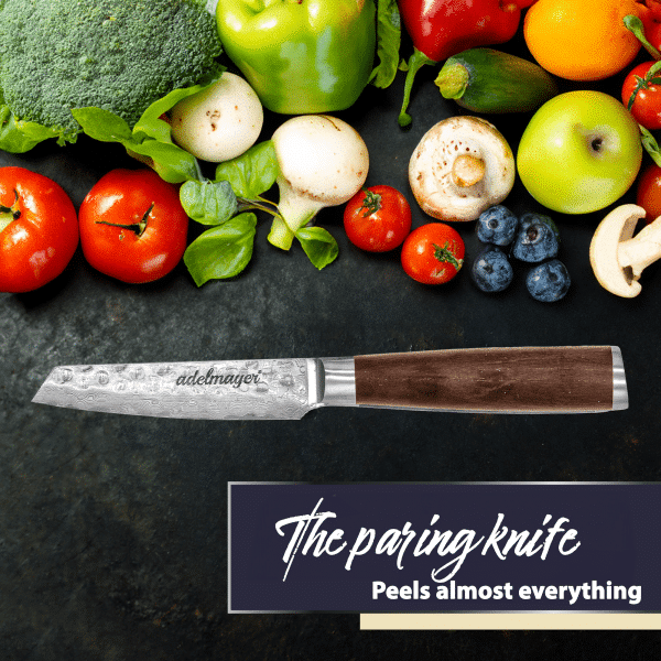 Paring knife with assorted fresh vegetables and fruits.