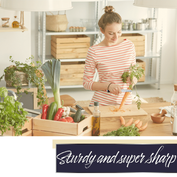 Woman peeling carrot in bright kitchen.