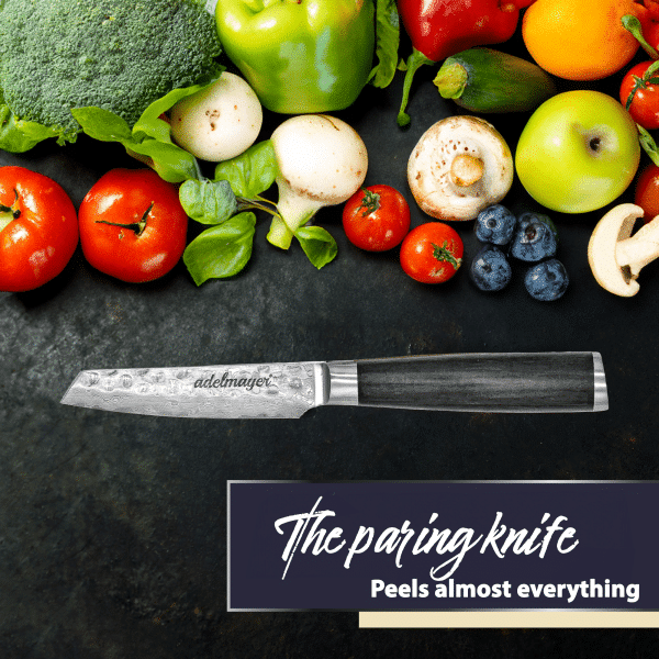 Paring knife with assorted fresh vegetables and fruit.